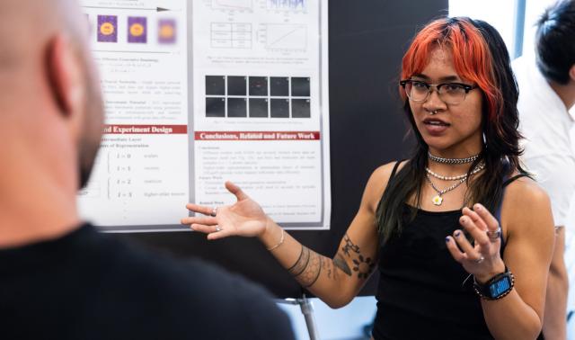 Woman presenting a poster