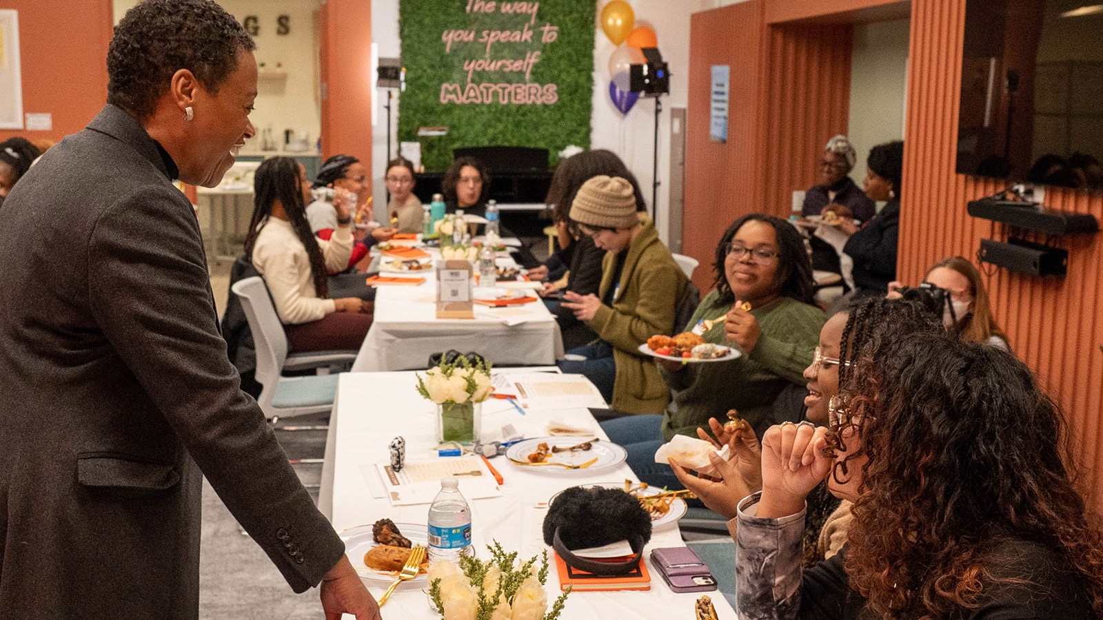 Women conversing at a table